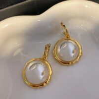 Discover our collection of elegant large pearl round shape earrings for a sophisticated and stylish look